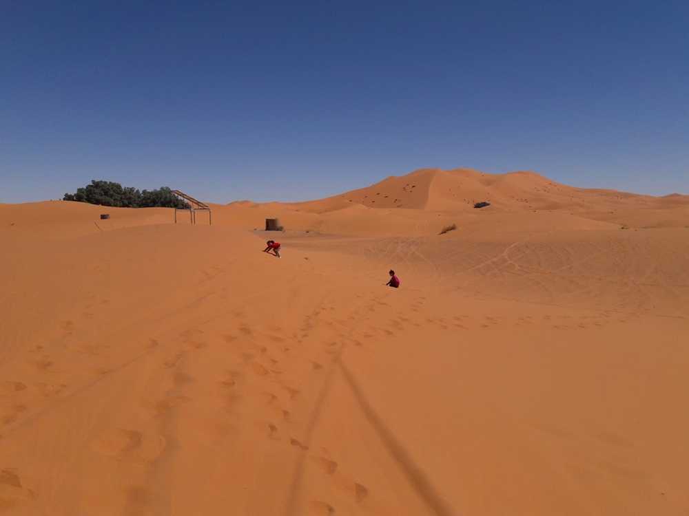 Merzouga - My little girls playing on sand